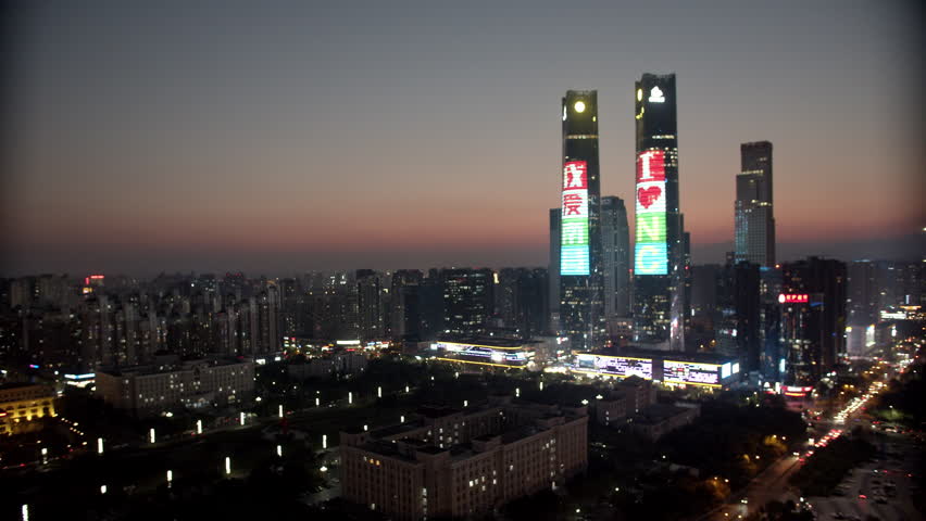 江西南昌红谷滩双子塔夜晚虚化背景4k视频